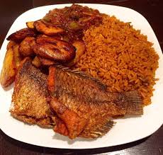 Jollof Rice, plantain, and Titus Fish 